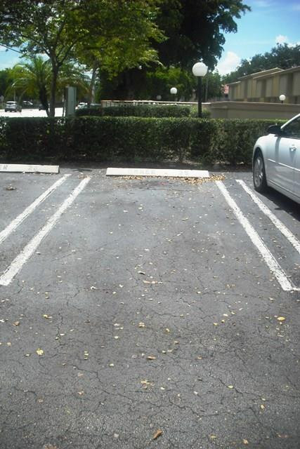 8401 West Sample Road, Unit 25 Coral Springs, FL 33065 - Photo 7 of 16 Assigned Parking space close to entrance
