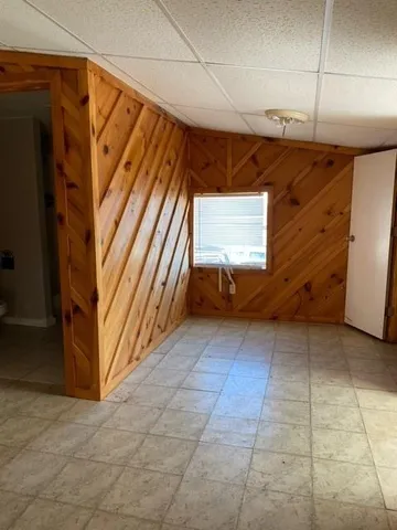 a view of a back yard from a room