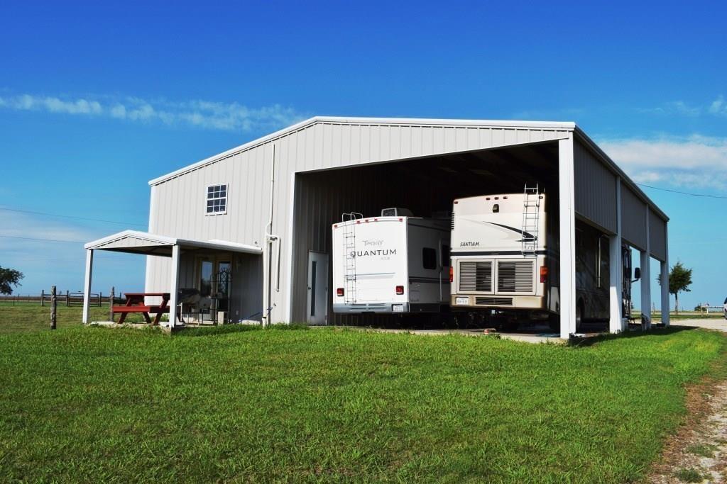 14550 Highway 78 Blue Ridge, TX 75424 - Photo 2 of 37 a view of a back yard with an outdoor seating