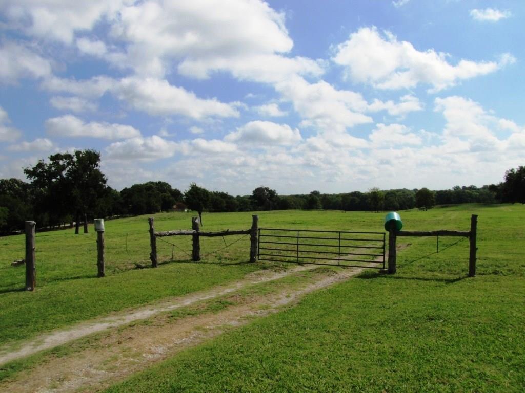 14550 Highway 78 Blue Ridge, TX 75424 - Photo 29 of 37 a view of a bench in grassy field