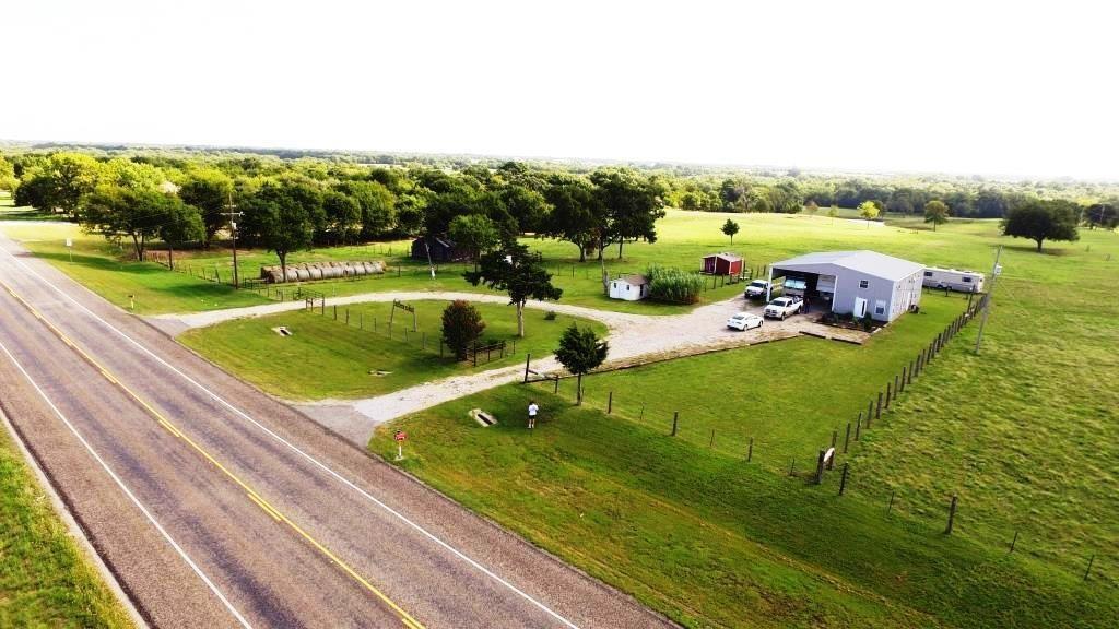 14550 Highway 78 Blue Ridge, TX 75424 - Photo 3 of 37 a view of a swimming pool and trees in the background
