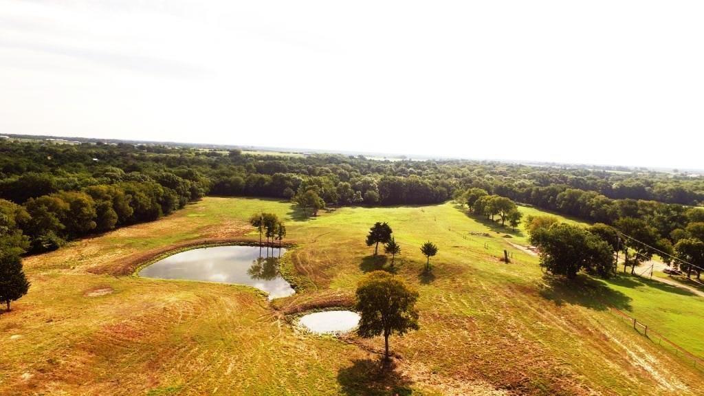 14550 Highway 78 Blue Ridge, TX 75424 - Photo 32 of 37 a view of a lake with a mountain