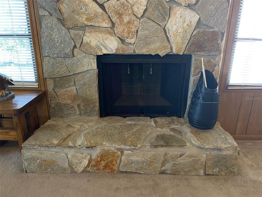 9940 Eagles Point Circle, Unit 4 Port Richey, FL 34668 - Photo 14 of 53 a bedroom with a bed and a window