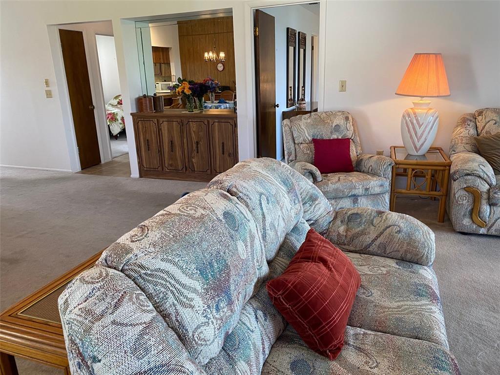 9940 Eagles Point Circle, Unit 4 Port Richey, FL 34668 - Photo 18 of 53 a bed room with a bed and a couch