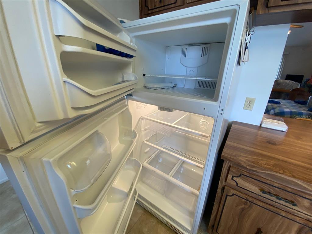 9940 Eagles Point Circle, Unit 4 Port Richey, FL 34668 - Photo 7 of 53 a view of storage and utility room