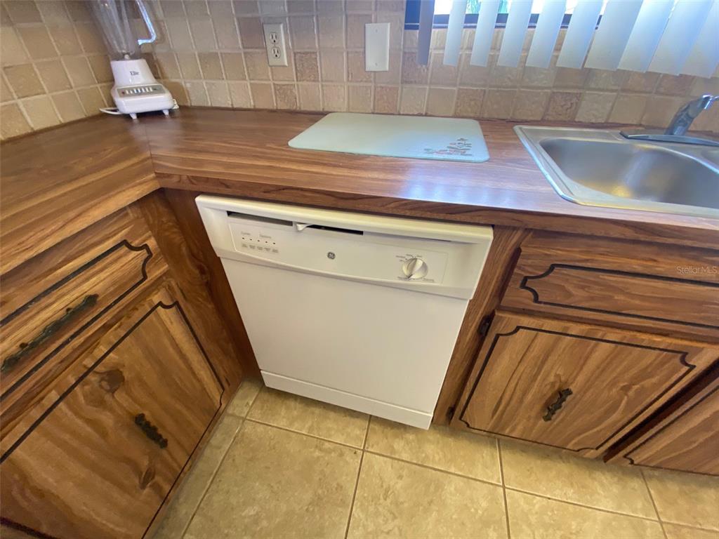 9940 Eagles Point Circle, Unit 4 Port Richey, FL 34668 - Photo 8 of 53 a view of a sink