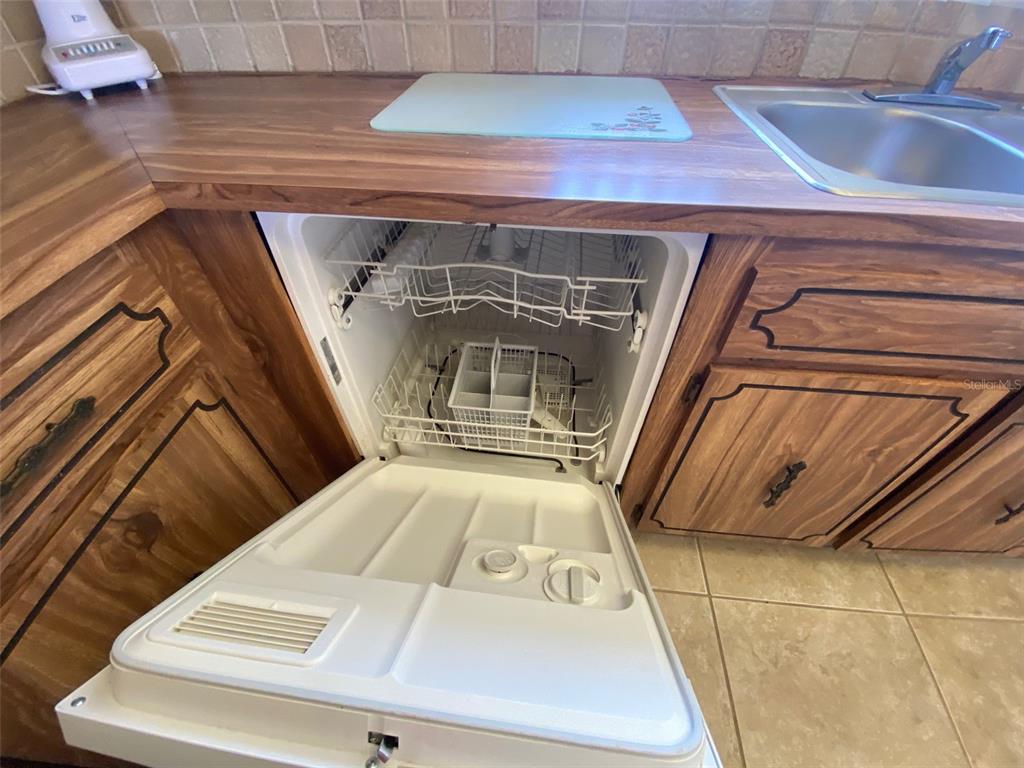 9940 Eagles Point Circle, Unit 4 Port Richey, FL 34668 - Photo 9 of 53 a view of parking