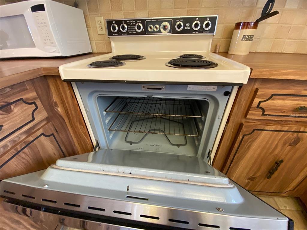 9940 Eagles Point Circle, Unit 4 Port Richey, FL 34668 - Photo 10 of 53 a close view of a fireplace in a room