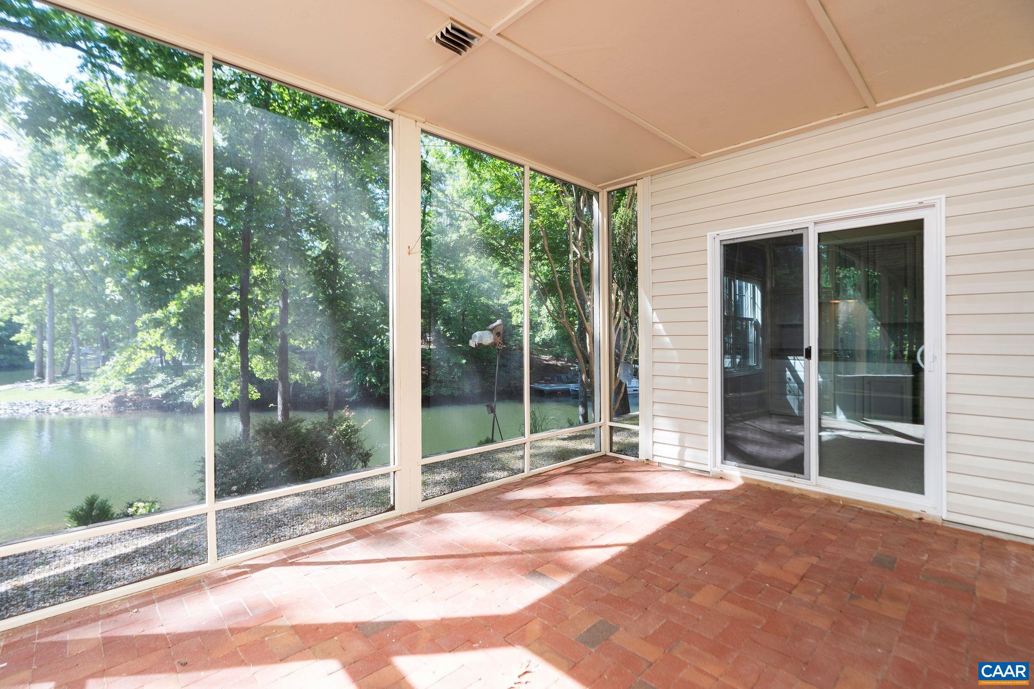 21 Amethyst Road Palmyra, VA 22963 - Photo 47 of 66 a view of a balcony with floor to ceiling windows