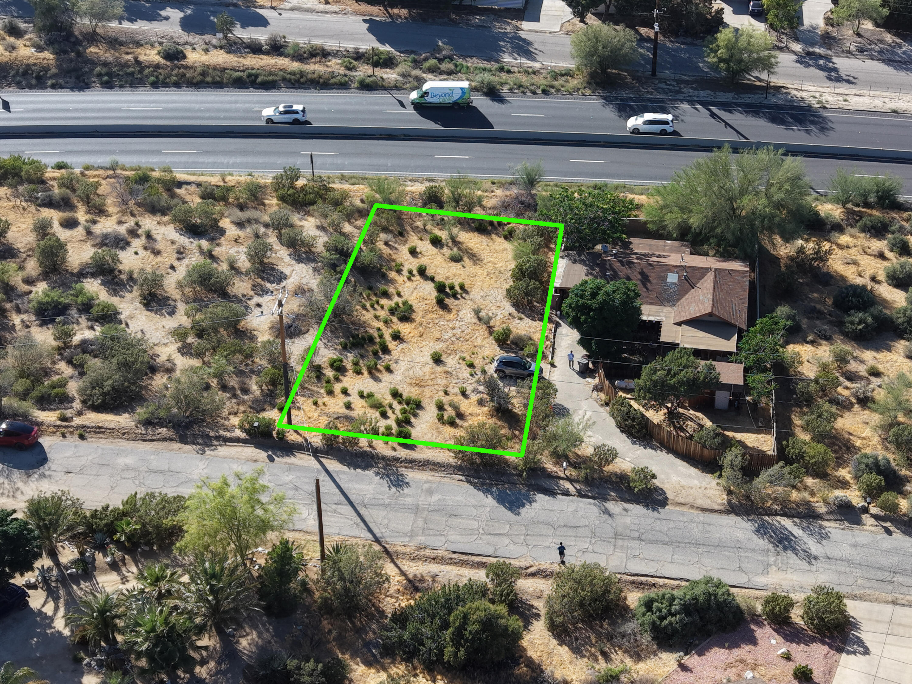 49462 Conejo Road Morongo Valley, CA 92256 - Photo 4 of 12 a view of a yard with flower plants