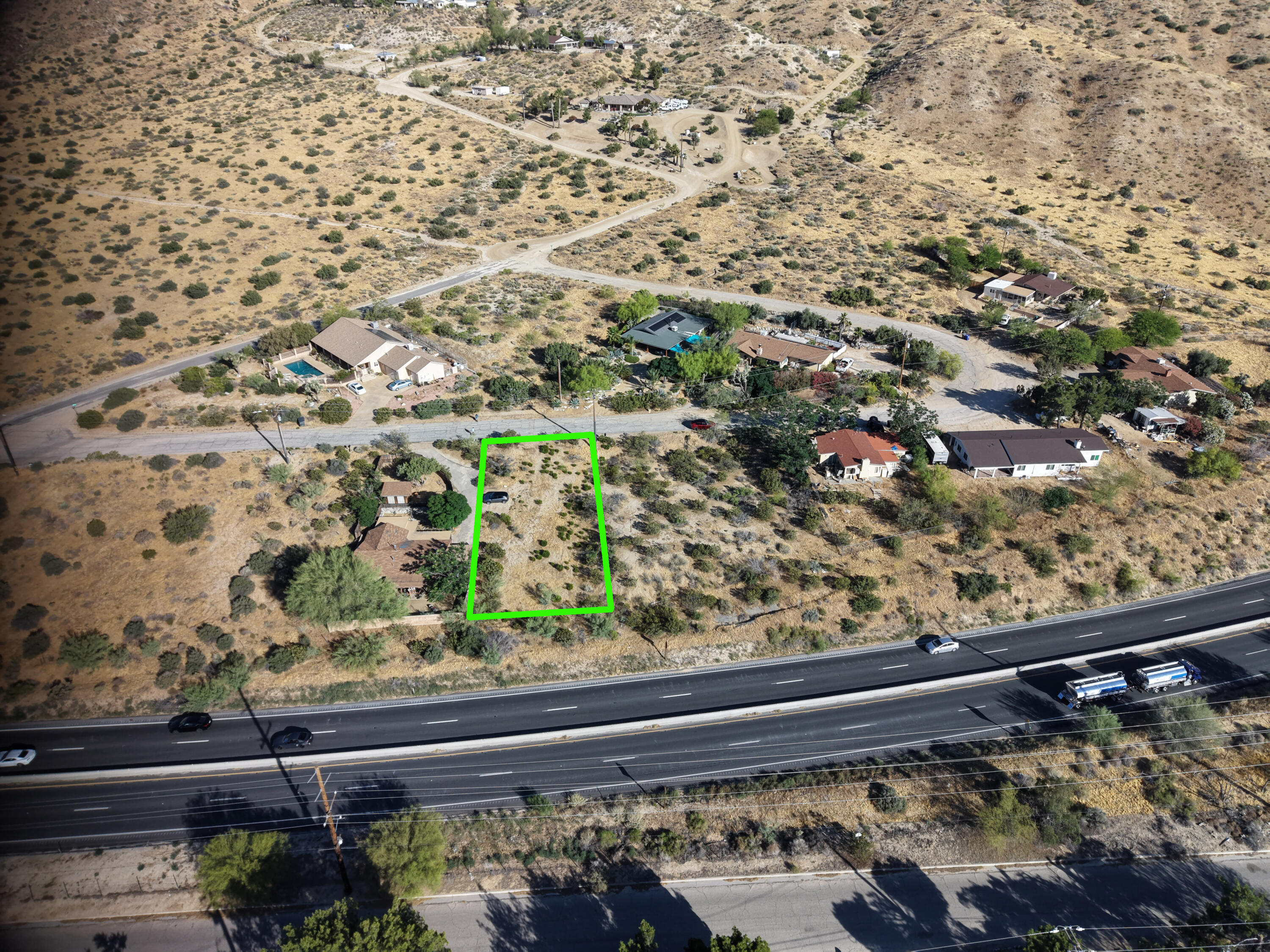 49462 Conejo Road Morongo Valley, CA 92256 - Photo 6 of 12 a view of a garden from a balcony