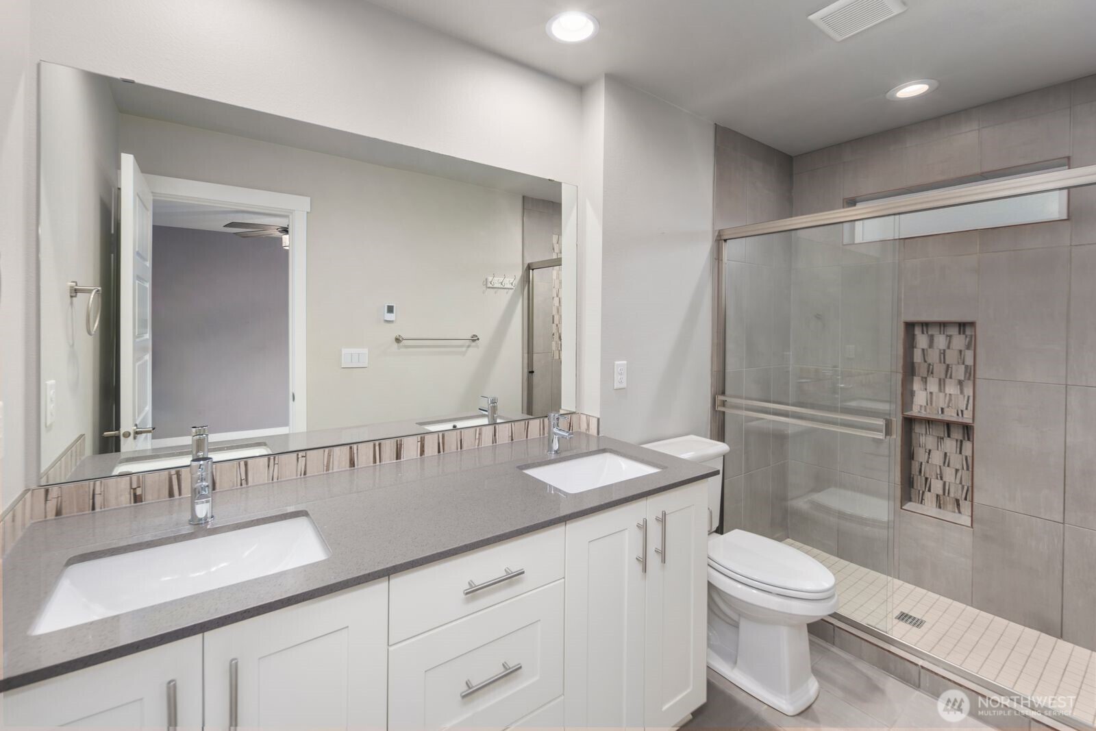 1325 Seattle Hill Road, Unit A2 Bothell, WA 98012 - Photo 29 of 34 a bathroom with a granite countertop sink toilet and shower