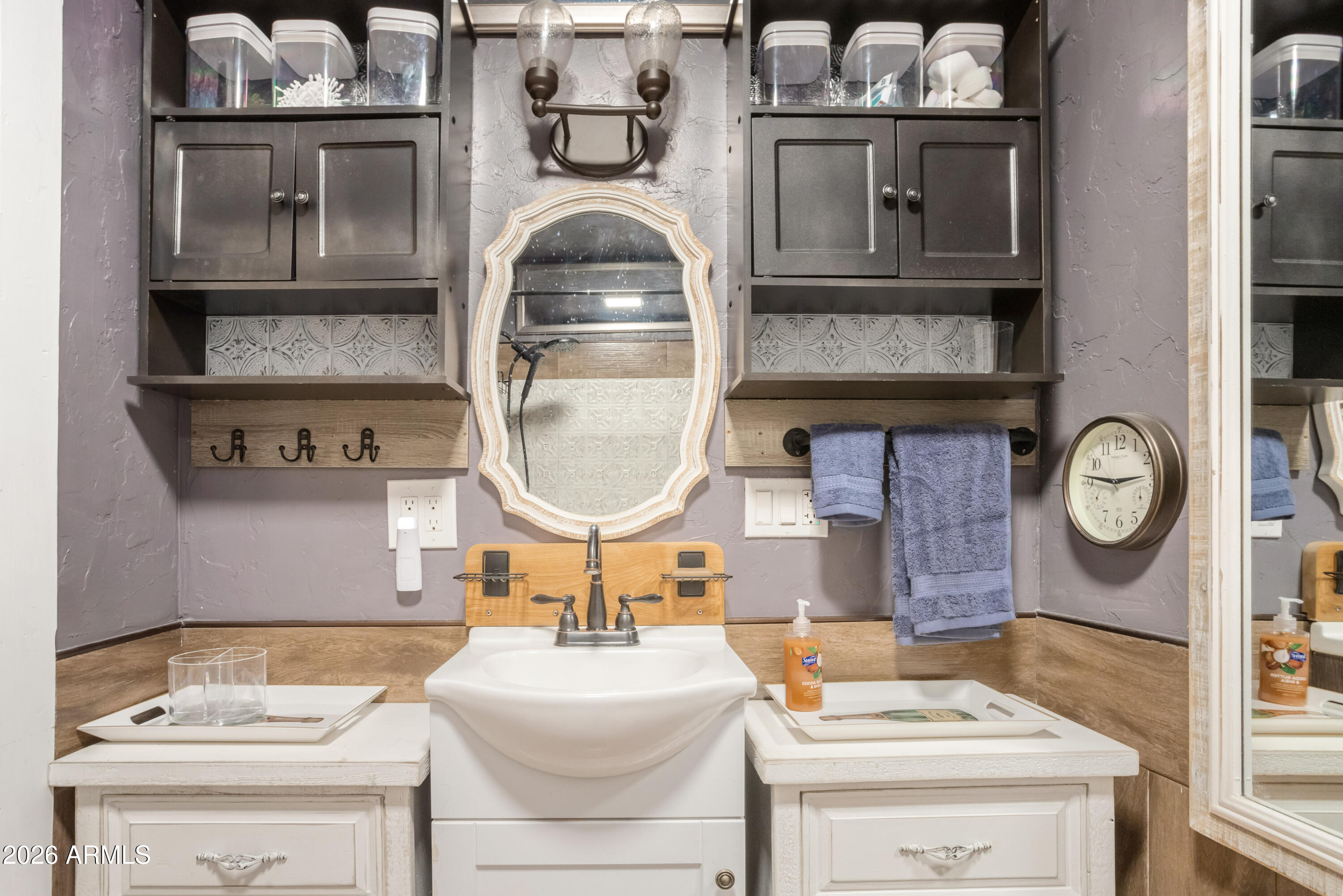 40 Main Street Bisbee, AZ 85603 - Photo 30 of 37 a bathroom with a sink and a mirror