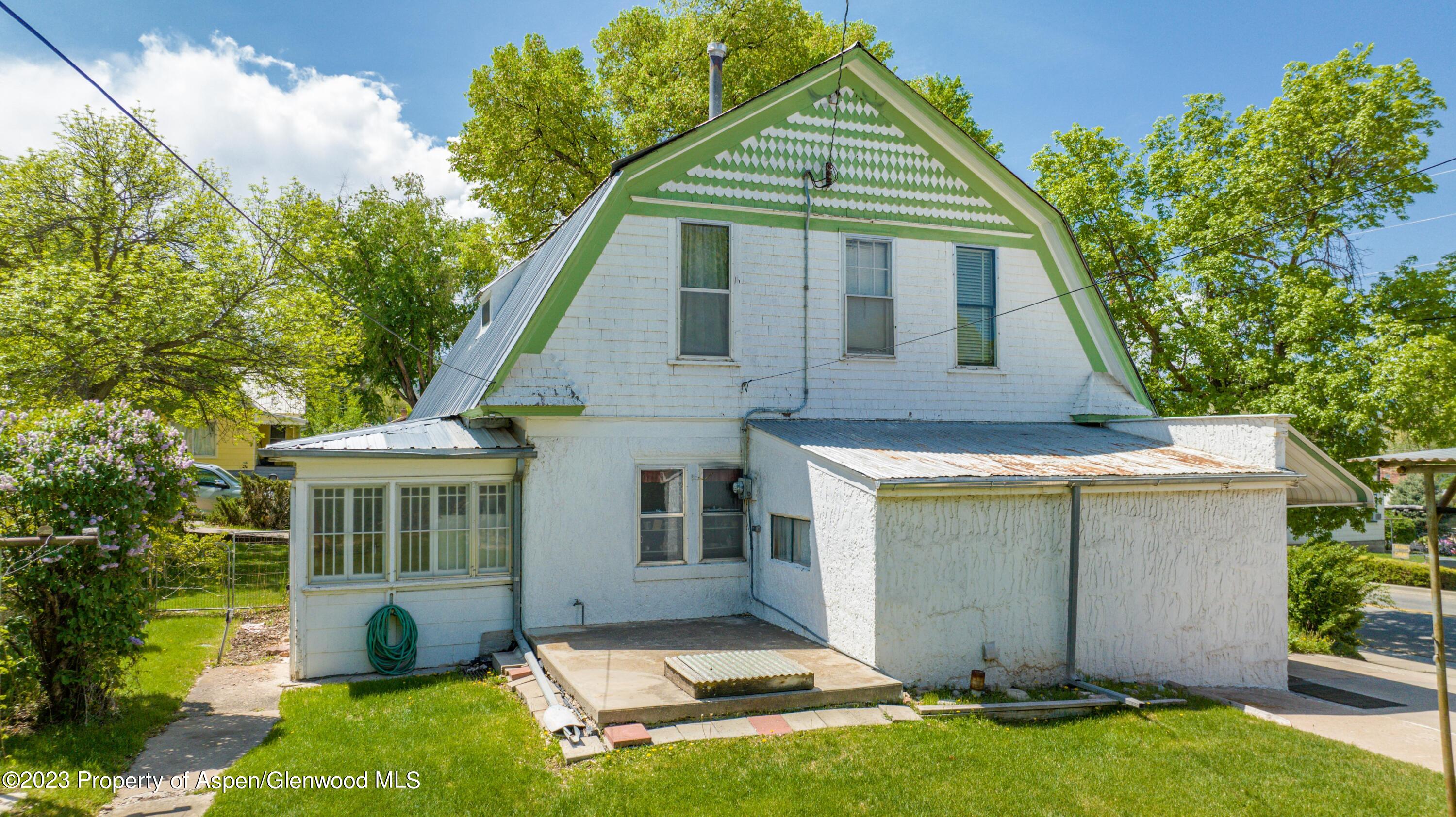 302 East 6th Street Rifle, CO 81650 - Photo 4 of 14 a view of house with yard and entertaining space