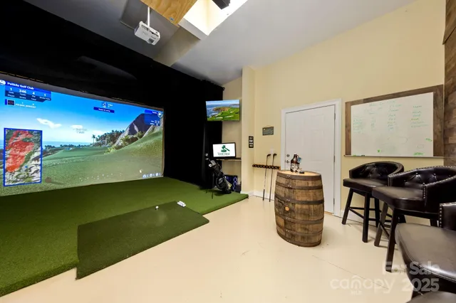 a room with furniture and a flat screen tv