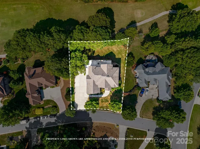 an aerial view of houses with outdoor space