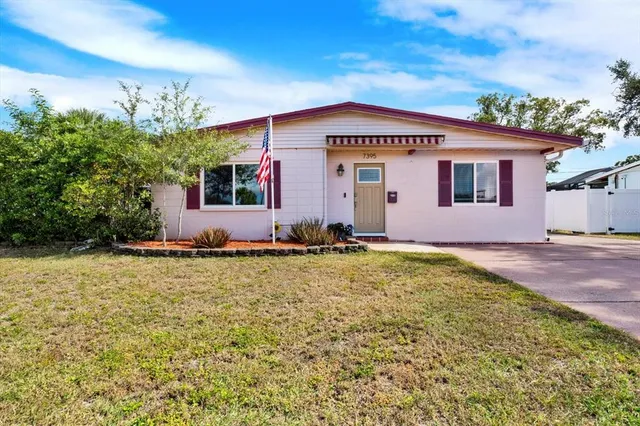 a front view of house with yard