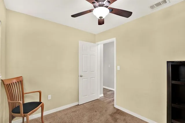 a view of a livingroom with a workspace