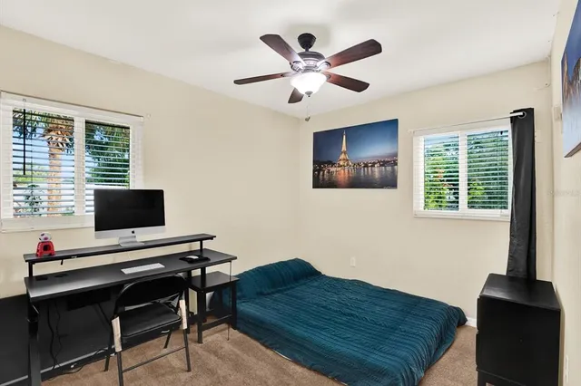 a workspace with furniture and window