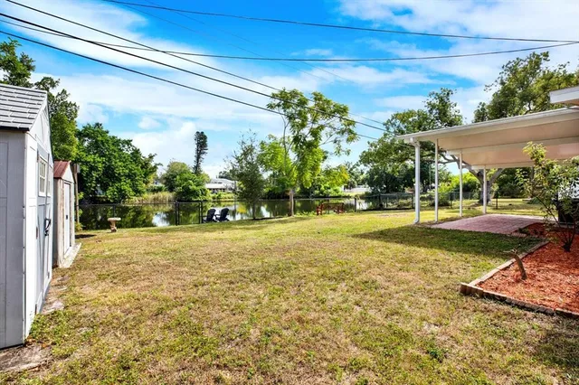 a view of a trees in front of a house
