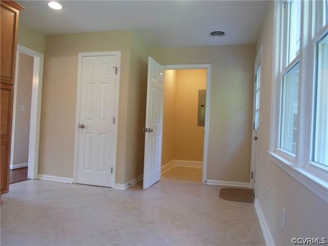 11400 Reedy Branch Road Chesterfield, VA 23838 - Photo 9 of 21 an empty room with windows