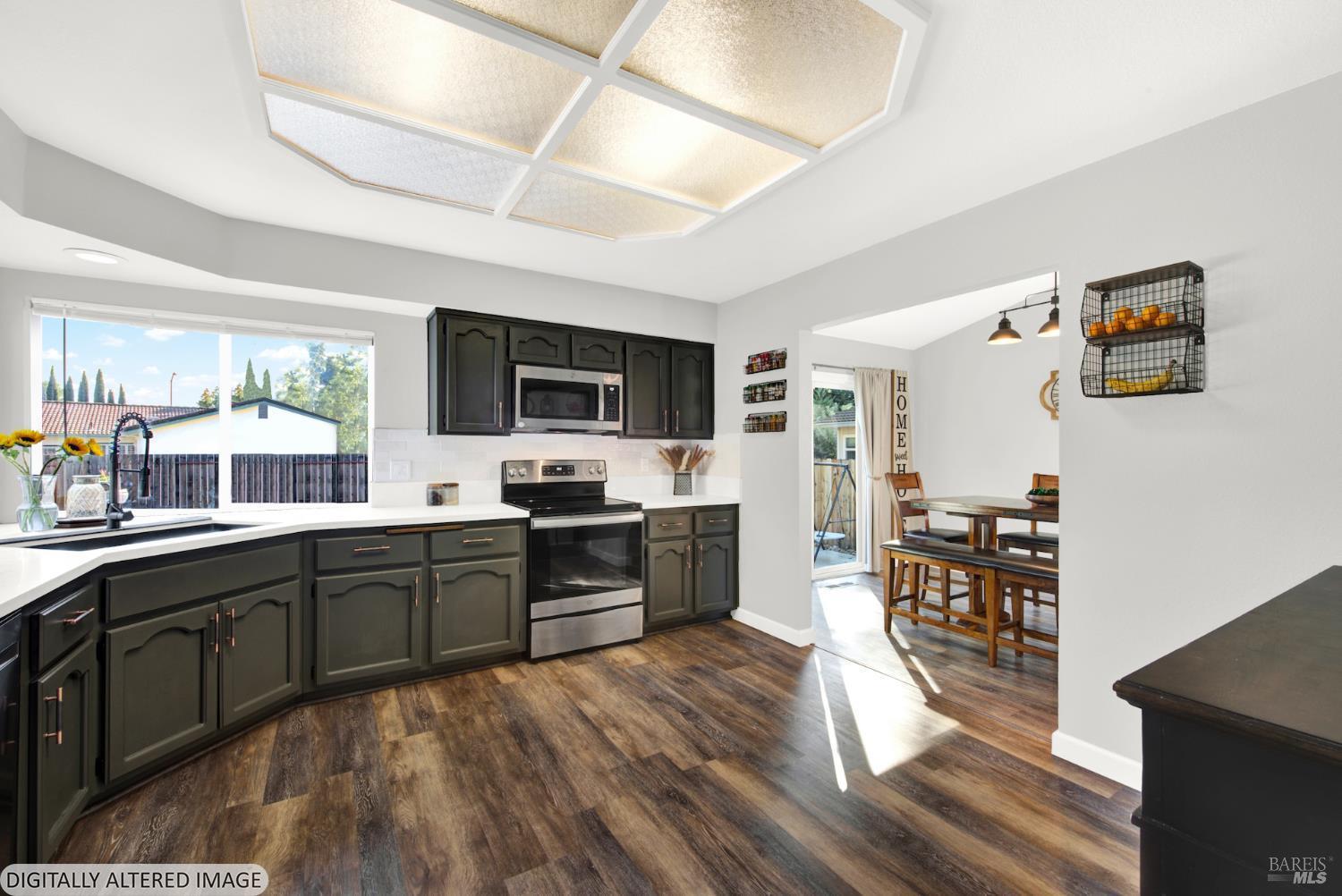 406 Stonecastle Way Vacaville, CA 95687 - Photo 11 of 45 This photo has been altered to simulate the updated windows. The window shown in the next picture has been replaced with a new window with white frames. The same is true for the windows in the living room and the primary bedroom.