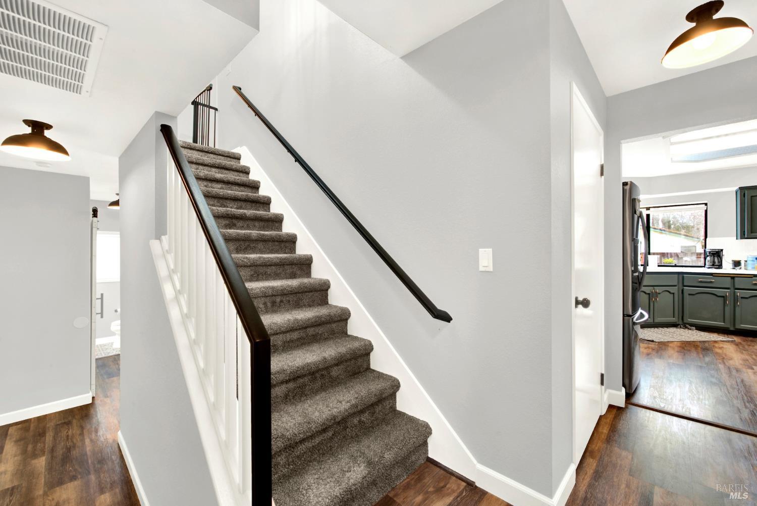 406 Stonecastle Way Vacaville, CA 95687 - Photo 16 of 45 This photo shows the newly painted handrail and banister.