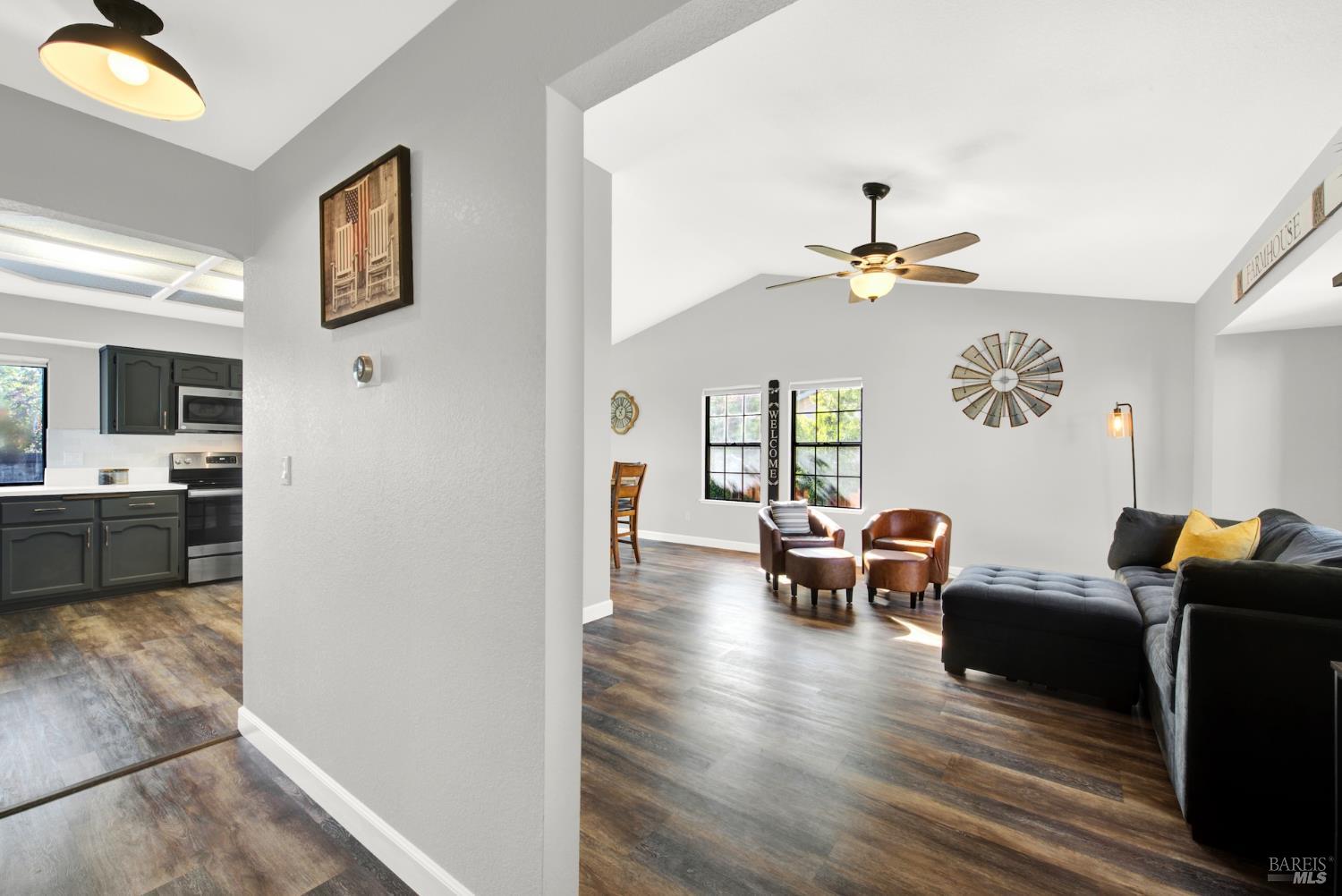 406 Stonecastle Way Vacaville, CA 95687 - Photo 5 of 45 The windows in the kitchen, living room, and primary bedroom were replaced after this photos was taken. All of the windows in this view have been replaced. The new windows have white frames. A simulated example of the new windows is shown in Picture 11.
