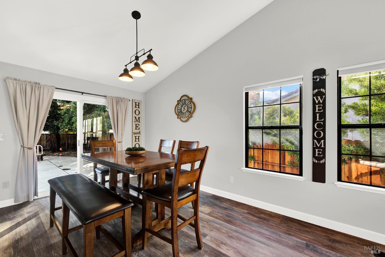 406 Stonecastle Way Vacaville, CA 95687 - Photo 9 of 45 The windows in the kitchen, living room, and primary bedroom were replaced after this photos was taken. The two windows on the right side have been replaced and the new windows have white frames.