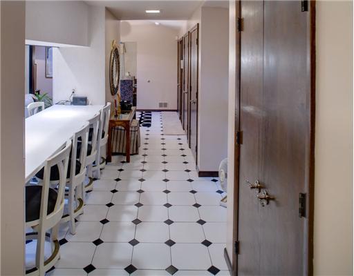 Other. Hallway from the entrance. It leads to the Kitchen, Dining Room, a bedroom (presently used as a den)and a full bath.