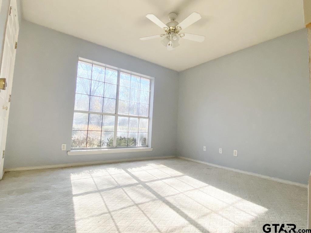 1707 Rotan Road Mount Pleasant, TX 75455 - Photo 11 of 18 a view of an empty room with a window