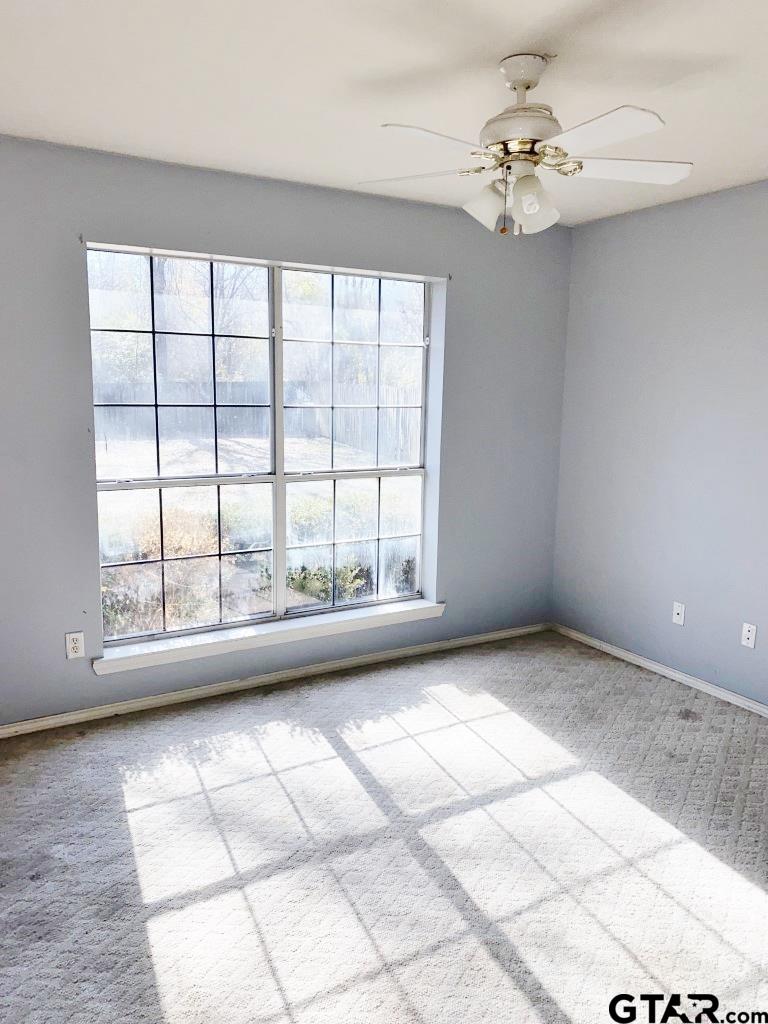 1707 Rotan Road Mount Pleasant, TX 75455 - Photo 12 of 18 a view of an empty room with a window