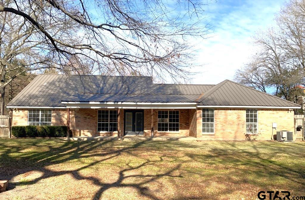 1707 Rotan Road Mount Pleasant, TX 75455 - Photo 15 of 18 a front view of a house with a yard