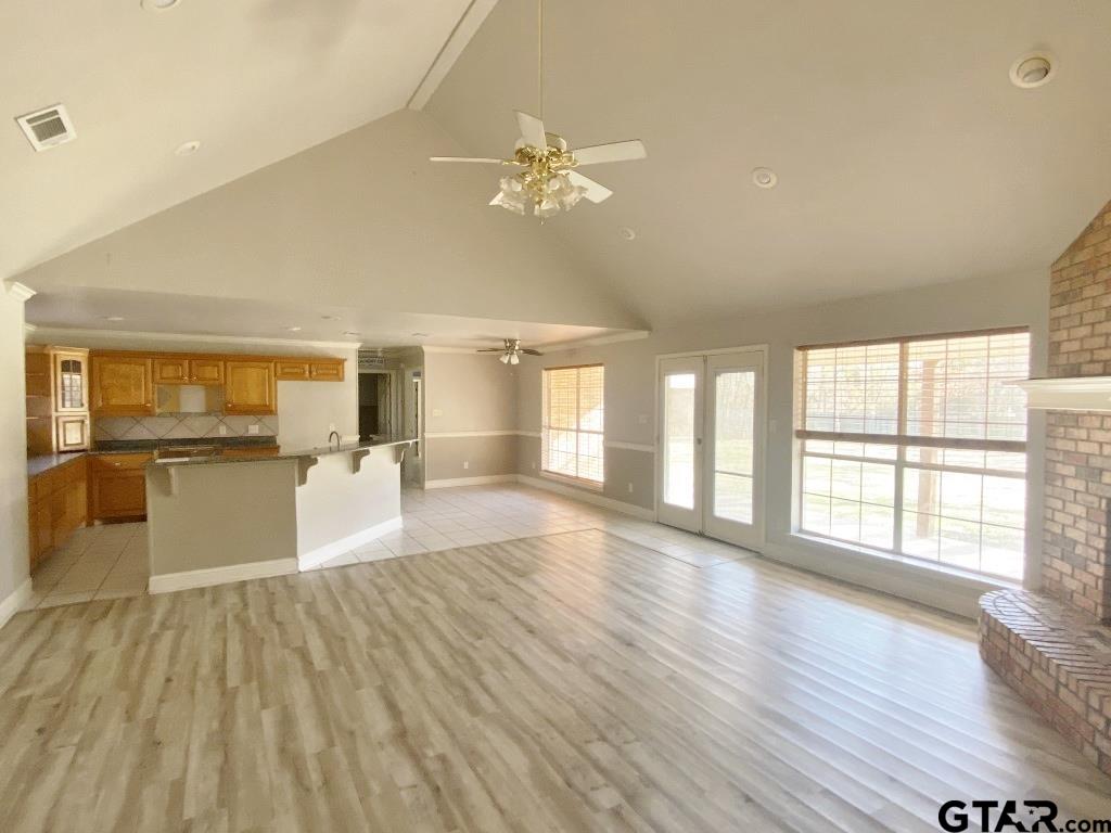 1707 Rotan Road Mount Pleasant, TX 75455 - Photo 6 of 18 a view of a living room kitchen with a large window