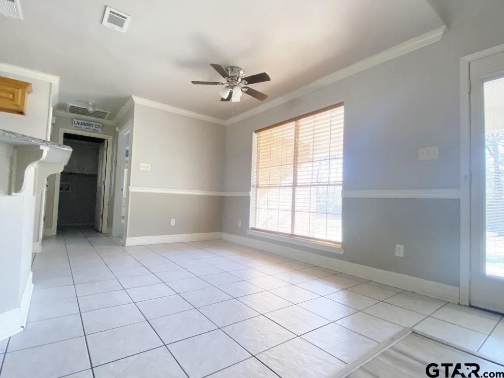 1707 Rotan Road Mount Pleasant, TX 75455 - Photo 7 of 18 a view of an empty room with a window