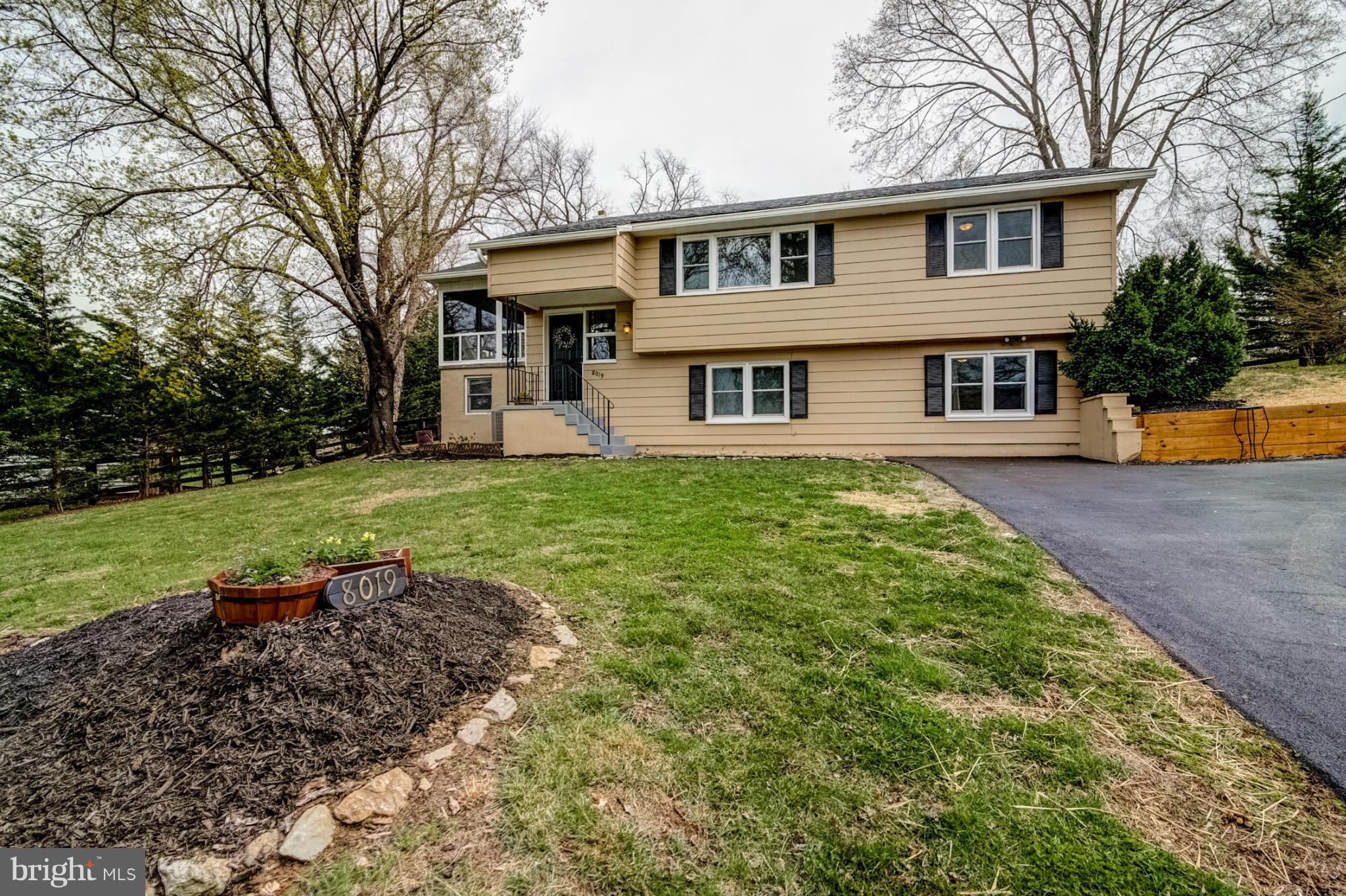 8019 Old Receiver Road Frederick, MD 21702 - Photo 1 of 25 a front view of a house with a yard