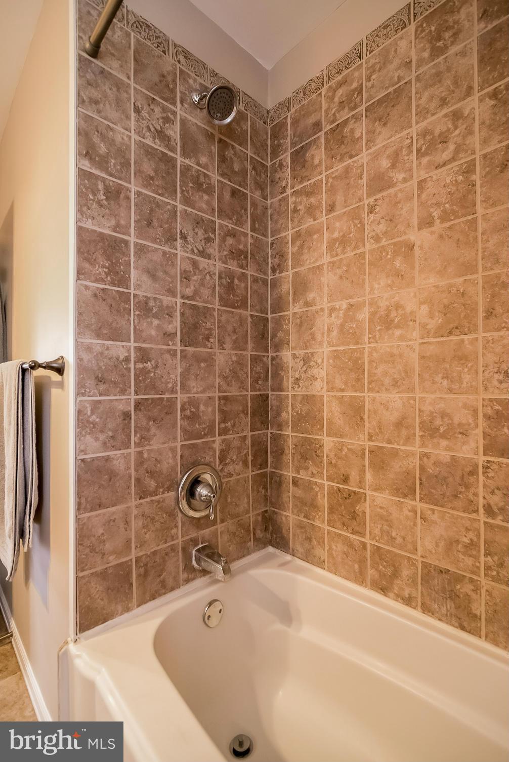 8019 Old Receiver Road Frederick, MD 21702 - Photo 13 of 25 a bathroom with a bathtub
