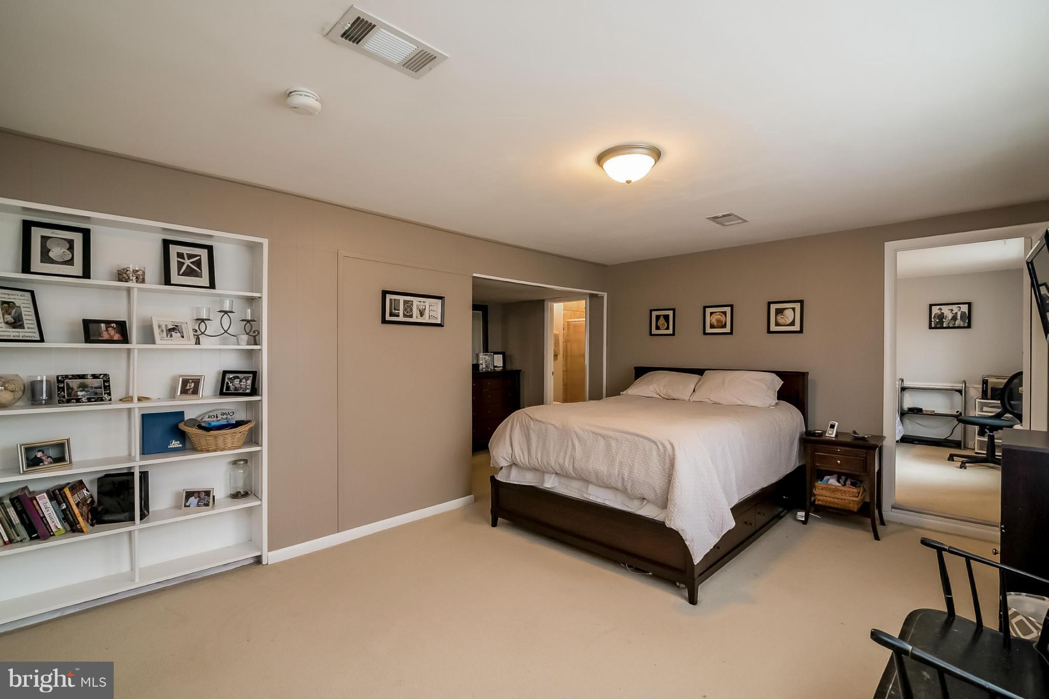 8019 Old Receiver Road Frederick, MD 21702 - Photo 14 of 25 a bedroom with a bed and furniture