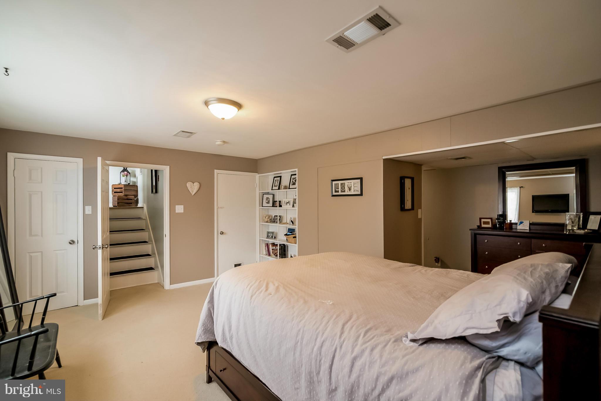 8019 Old Receiver Road Frederick, MD 21702 - Photo 15 of 25 a bedroom with a bed and furniture