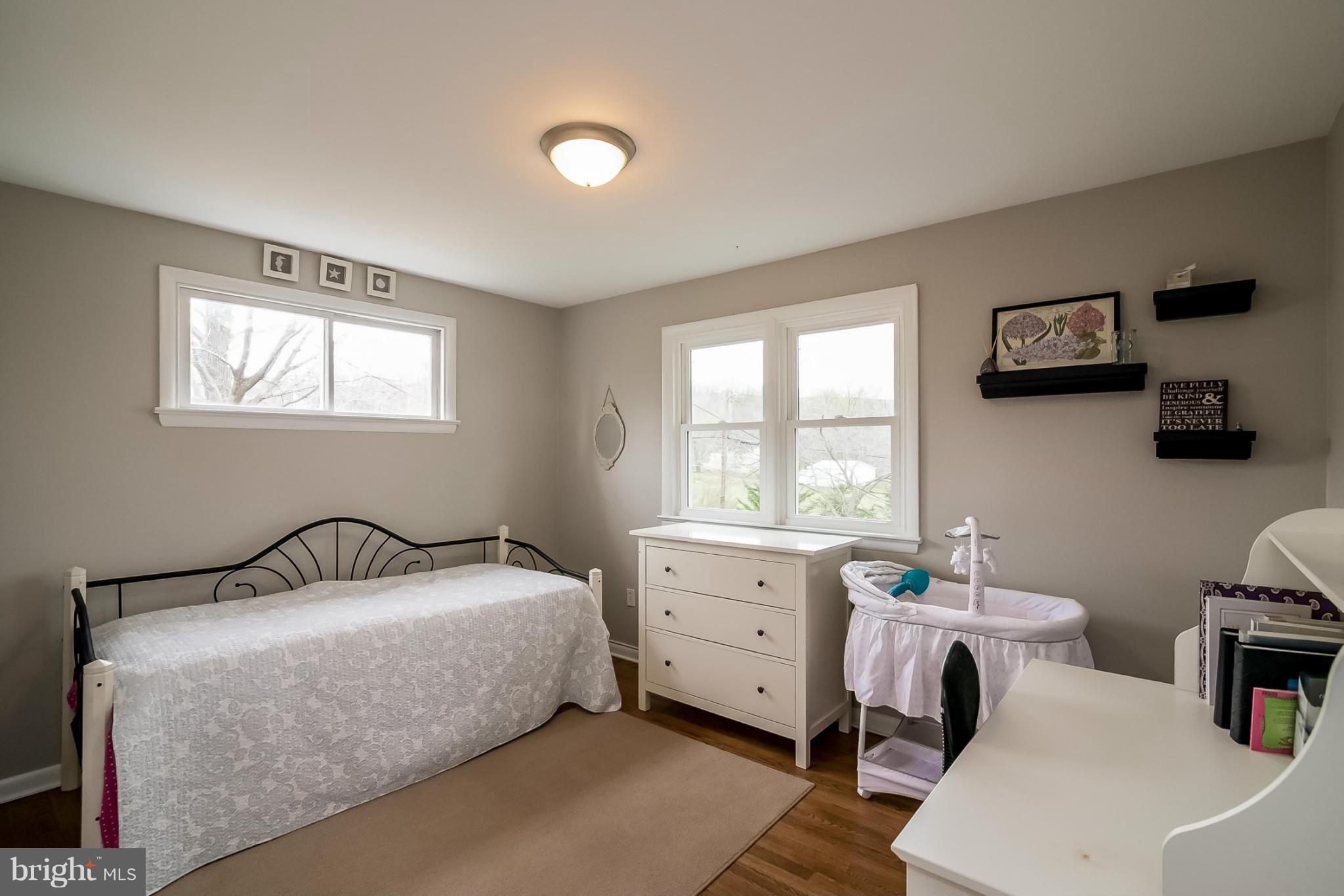 8019 Old Receiver Road Frederick, MD 21702 - Photo 10 of 25 a bedroom with a bed and a window