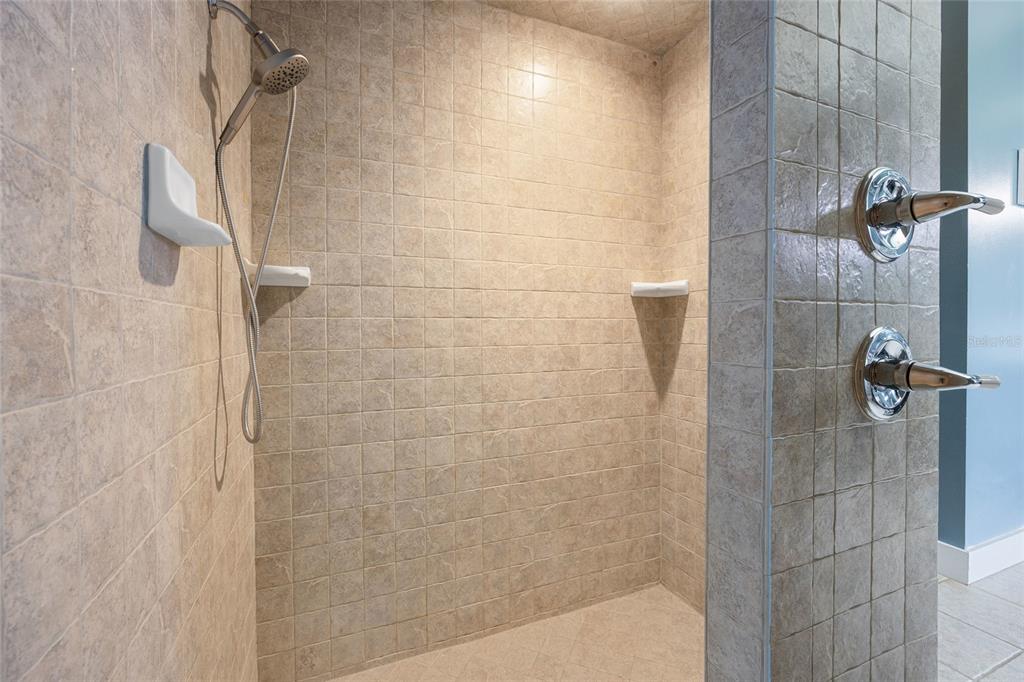25 Southeast 69th Place Ocala, FL 34480 - Photo 18 of 52 a bathroom with a shower