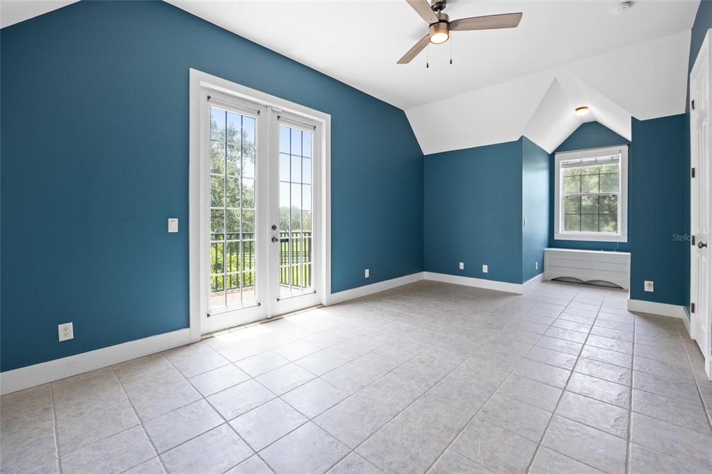 25 Southeast 69th Place Ocala, FL 34480 - Photo 23 of 52 a view of a livingroom with a ceiling fan and window