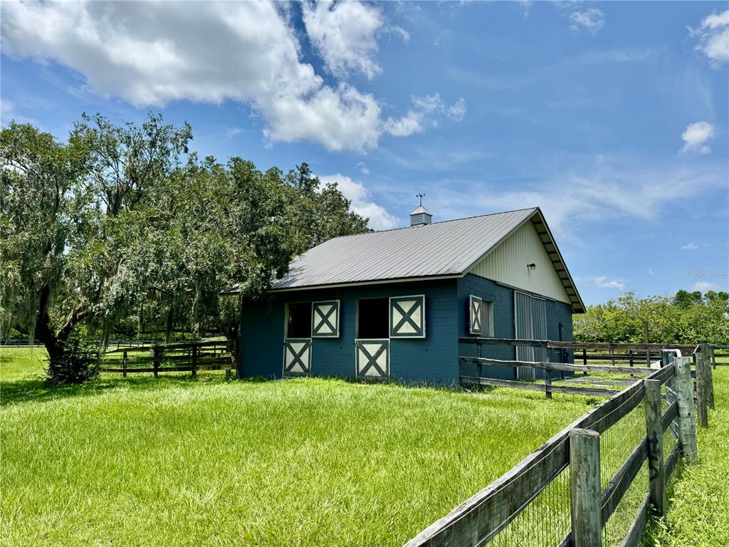 25 Southeast 69th Place Ocala, FL 34480 - Photo 47 of 52 a front view of house with yard and green space
