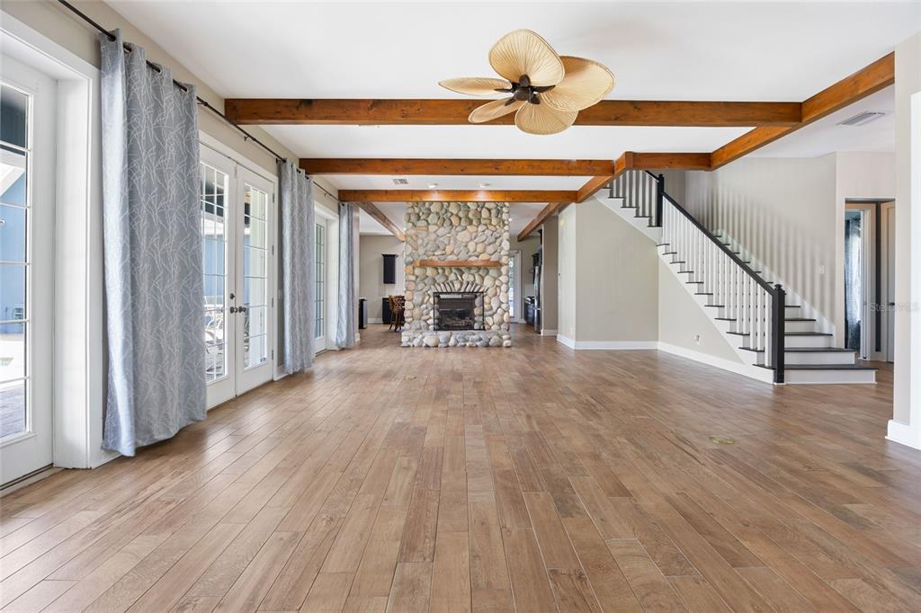 25 Southeast 69th Place Ocala, FL 34480 - Photo 8 of 52 a view of a livingroom with wooden floor