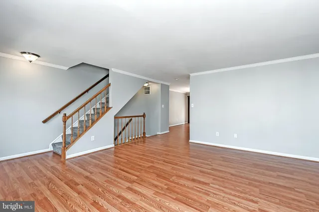 a view of entryway with wooden floor