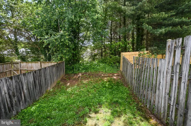 a view of a wooden fence