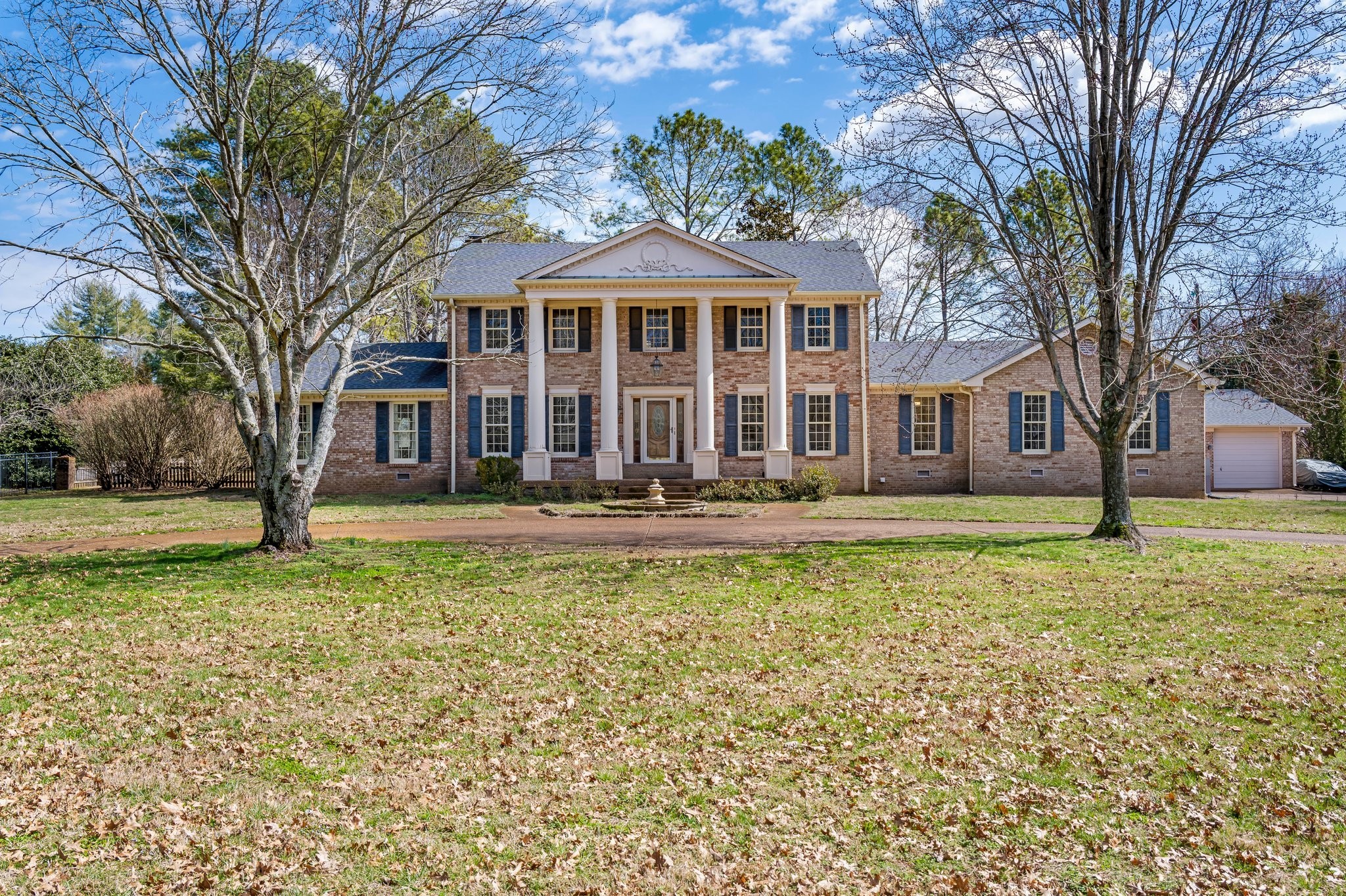 6375 Chickering Circle Nashville, TN 37215 - Photo 1 of 59 a front view of a house with a yard