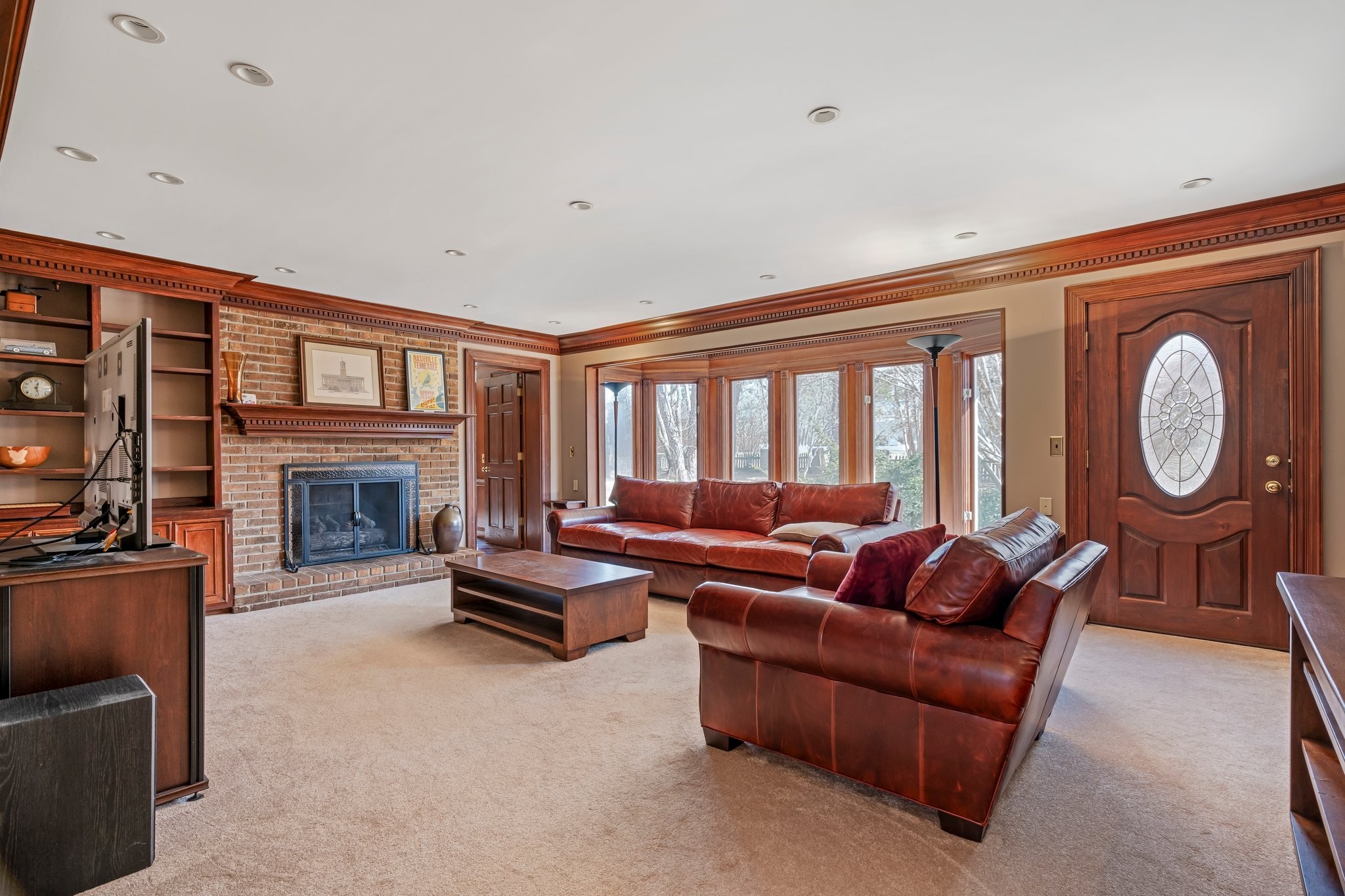 6375 Chickering Circle Nashville, TN 37215 - Photo 12 of 59 a living room with furniture a fireplace and a large window