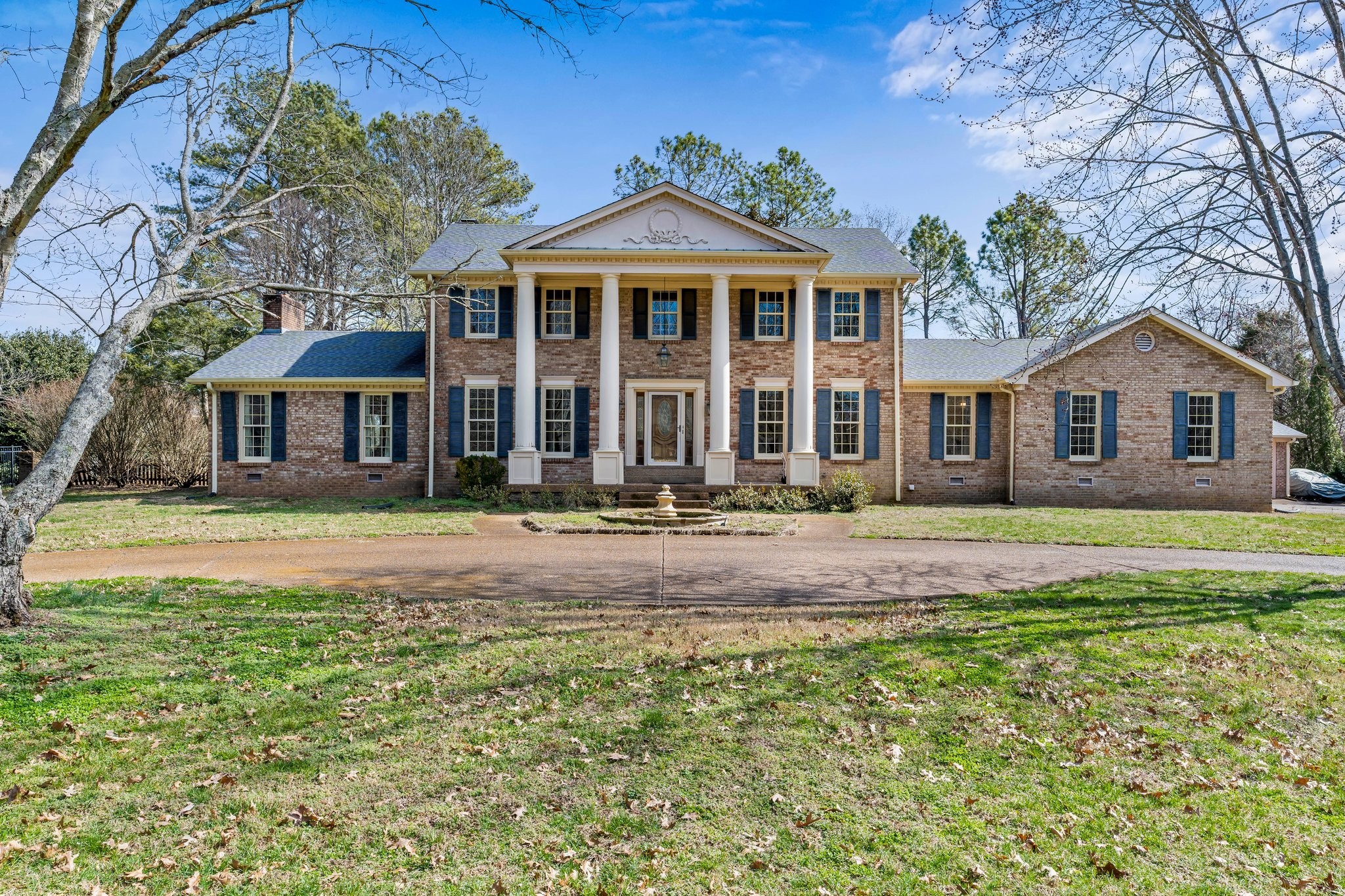 6375 Chickering Circle Nashville, TN 37215 - Photo 2 of 59 a front view of a house with a yard