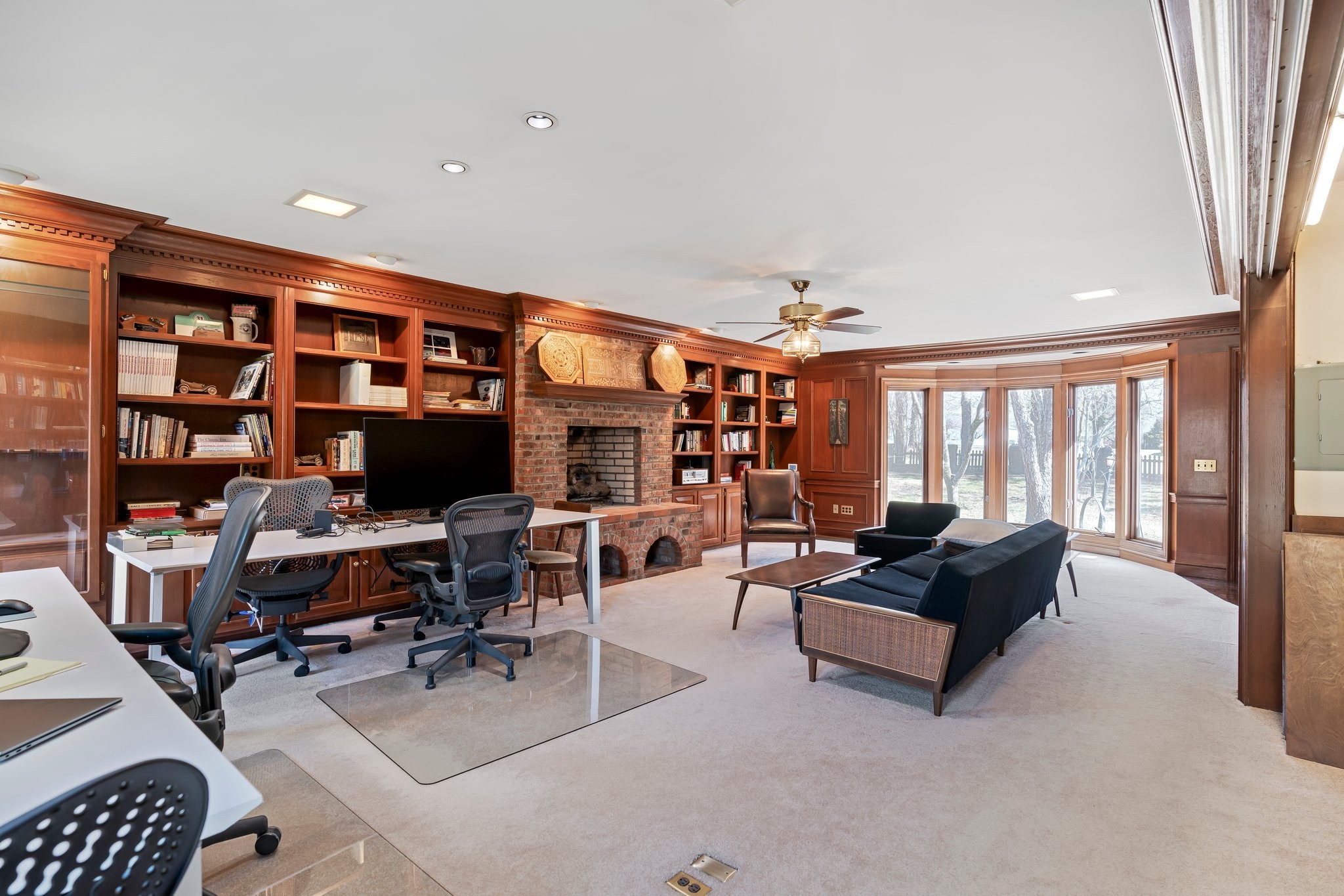 6375 Chickering Circle Nashville, TN 37215 - Photo 21 of 59 a living room with furniture a bookshelf and a large window